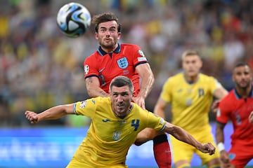 Serhiy Kryvtsov of Ukraine and Ben Chilwell (back) of England 